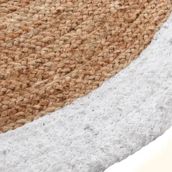 Tapis en jute bord blanc